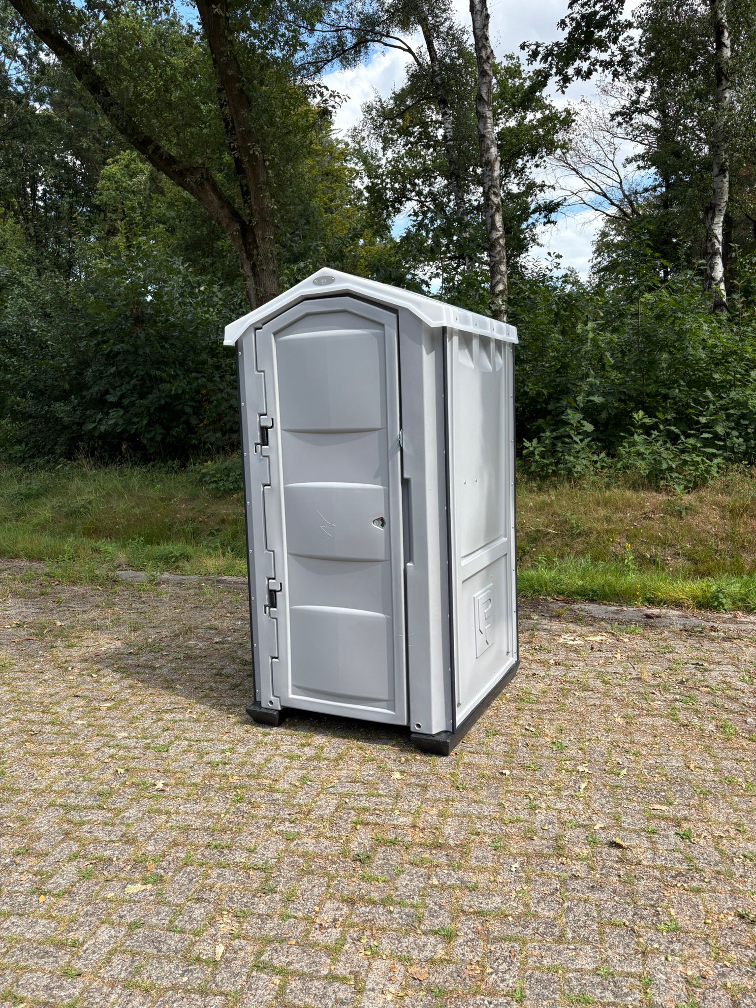 Toiletcabine voorkant Voorzijde dixi toilet grijs