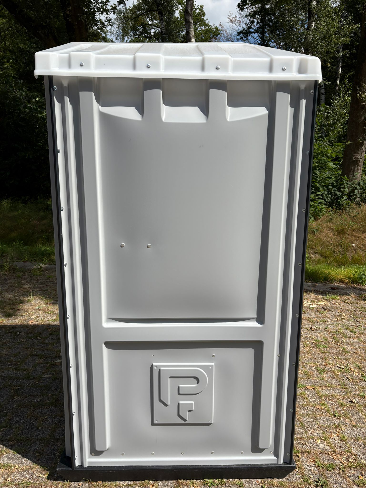 Zijkant toiletcabine Dixi grijs