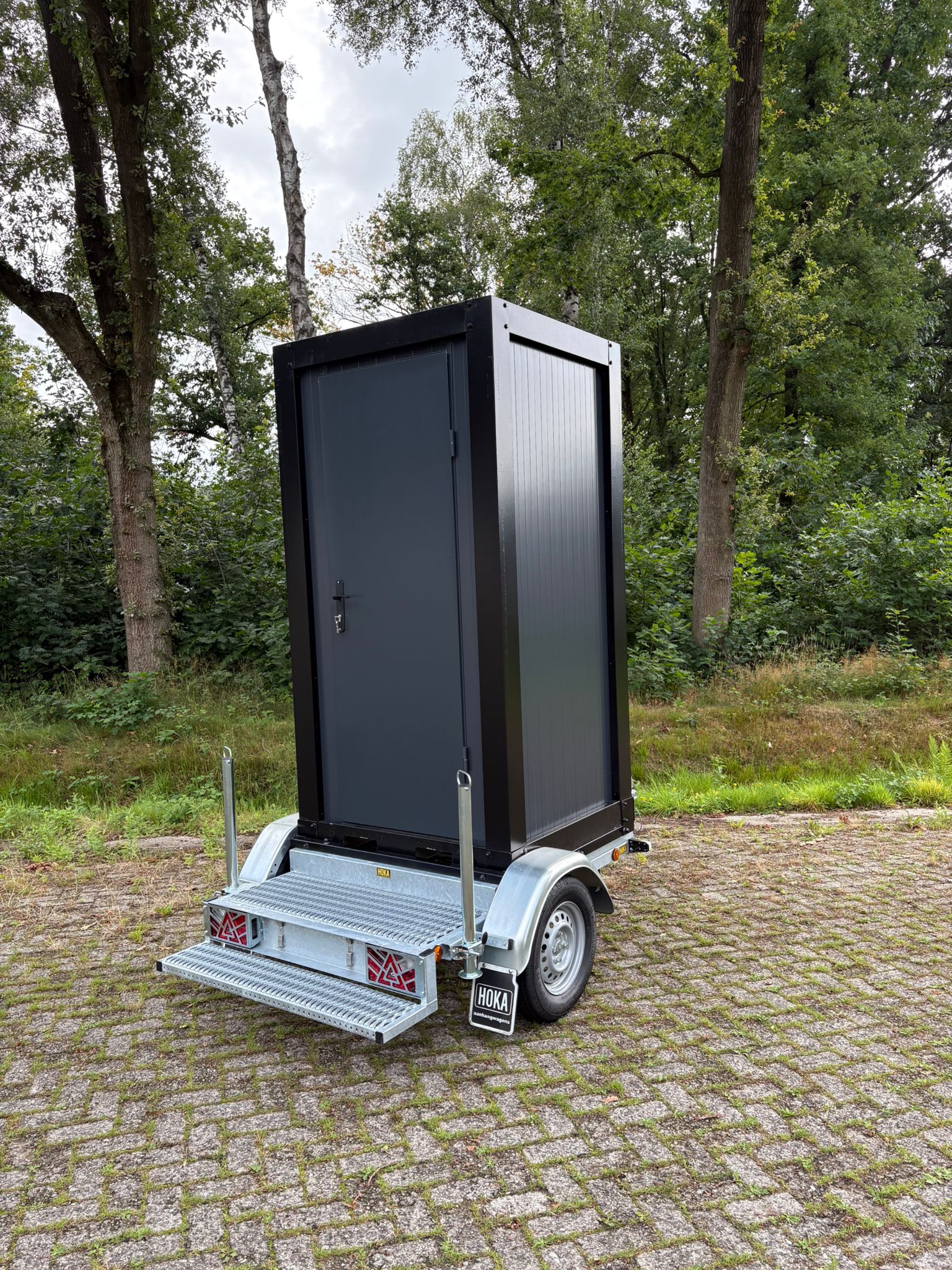 Douchewagen voorkant Mobiele douchecabine op een aanhanger